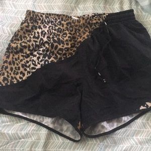Pink animal print track shorts